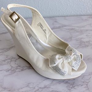 Cute White Wedge with a Bow